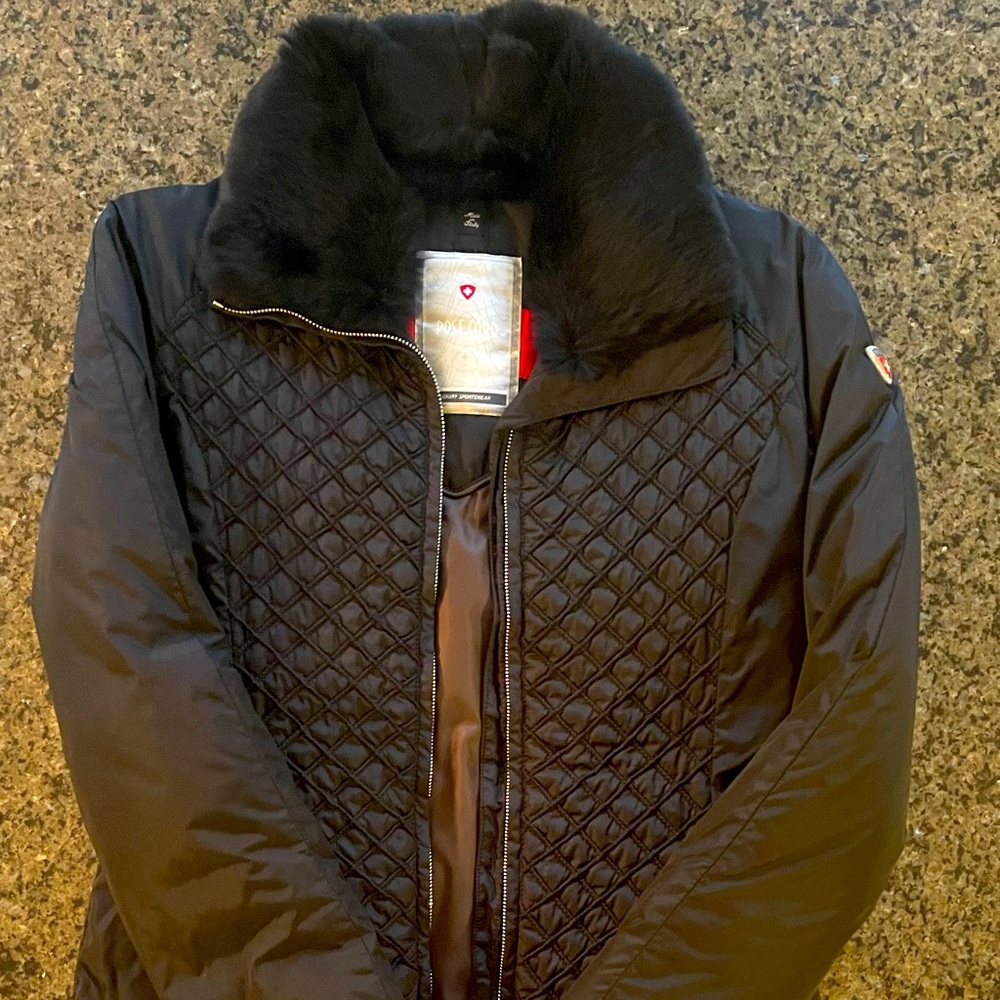 Postcard ski jacket used gently . No defects . Rips or tears